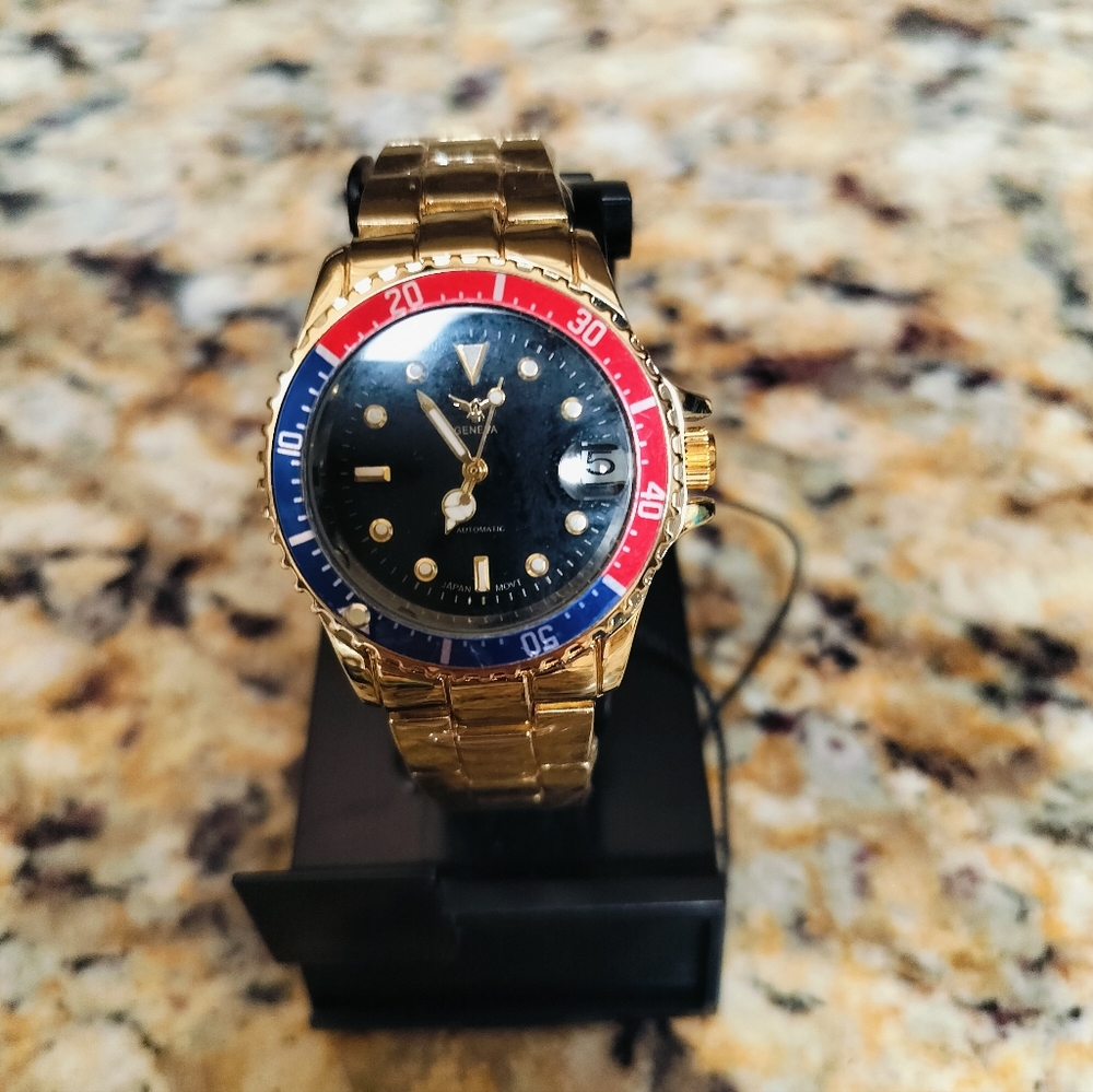 Woman's red/blue bezel automatic watch